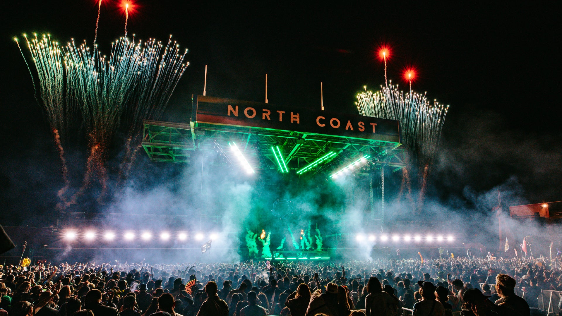 OCB at North Coast picture of North Coast stage at Seat Geek Stadium Chicago with large crowd in front and fireworks in the background